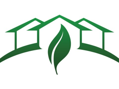 Häuser-Piktogramm mit grünem Blatt