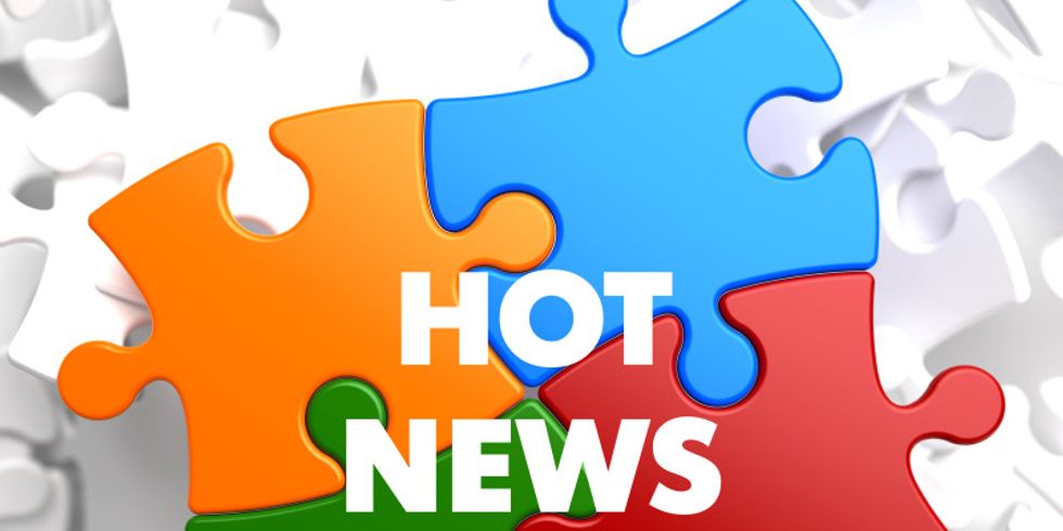Puzzle-Teile mit der Aufschrift "Hot News"