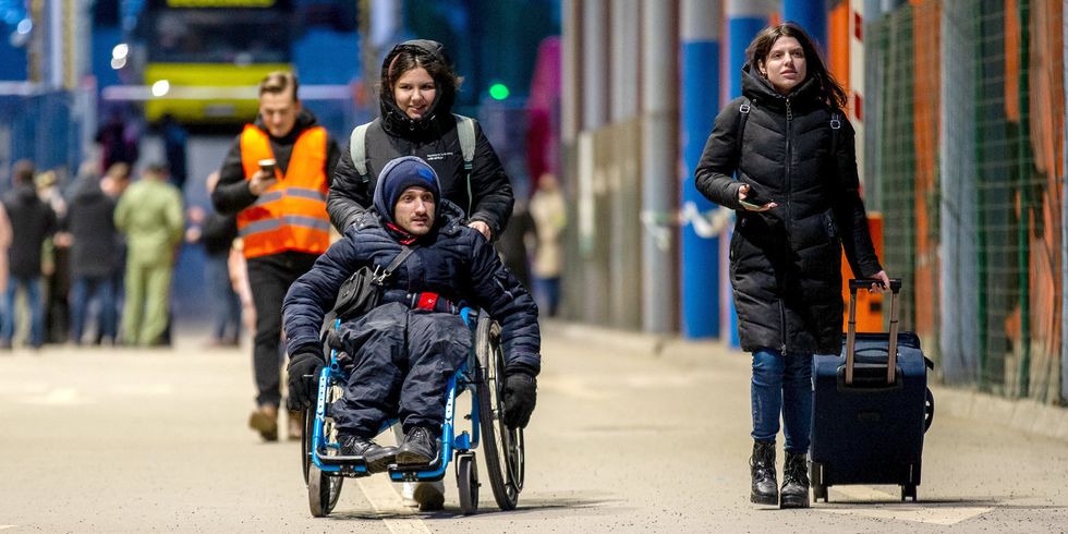 Geflüchtete im Rollstuhl