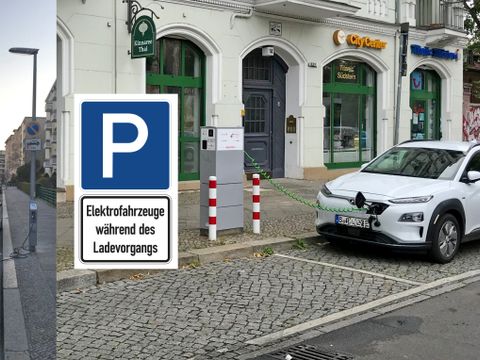 Parkplatz - Elektrofahrzeuge während des Ladevorgangs