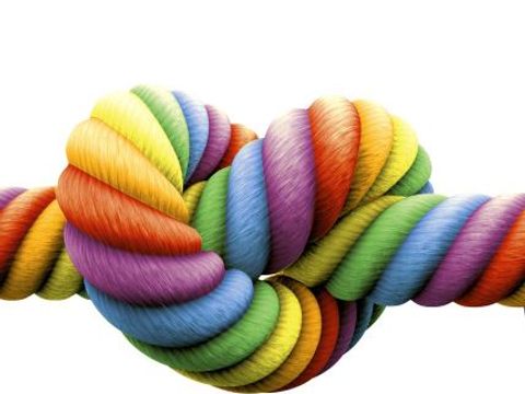 bunter zum Herz geformter Knoten in Regenbogenfarben