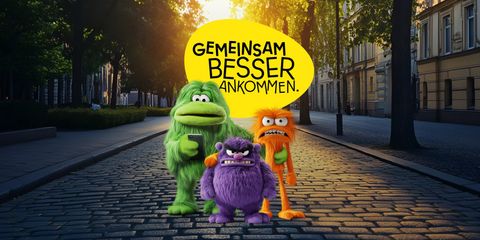 Kampagne "Gemeinsam besser ankommen", drei Verkehrsmonster auf der Straße mit Kampagnenbezeichnung als Text (ohne Logo)