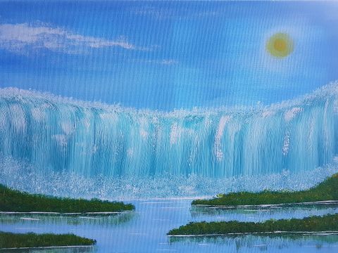 Wasserfall - ein hellblauer, bildfüllend breiter Wasserfall ergießt sich in einen blauen See mit grünen Landzungen