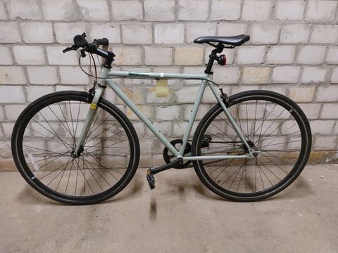 Grau-grünes Herrenfahrrad