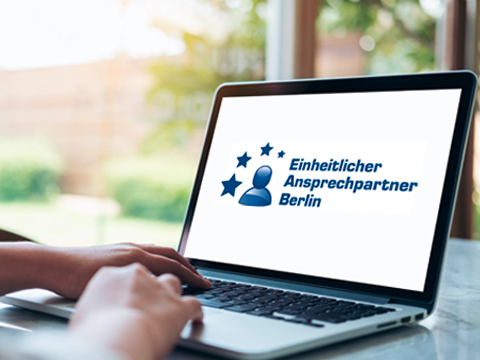 Geöffneter Laptop mit dem Logo des Einheitlichen Ansprechpartners auf dem Bildschrim