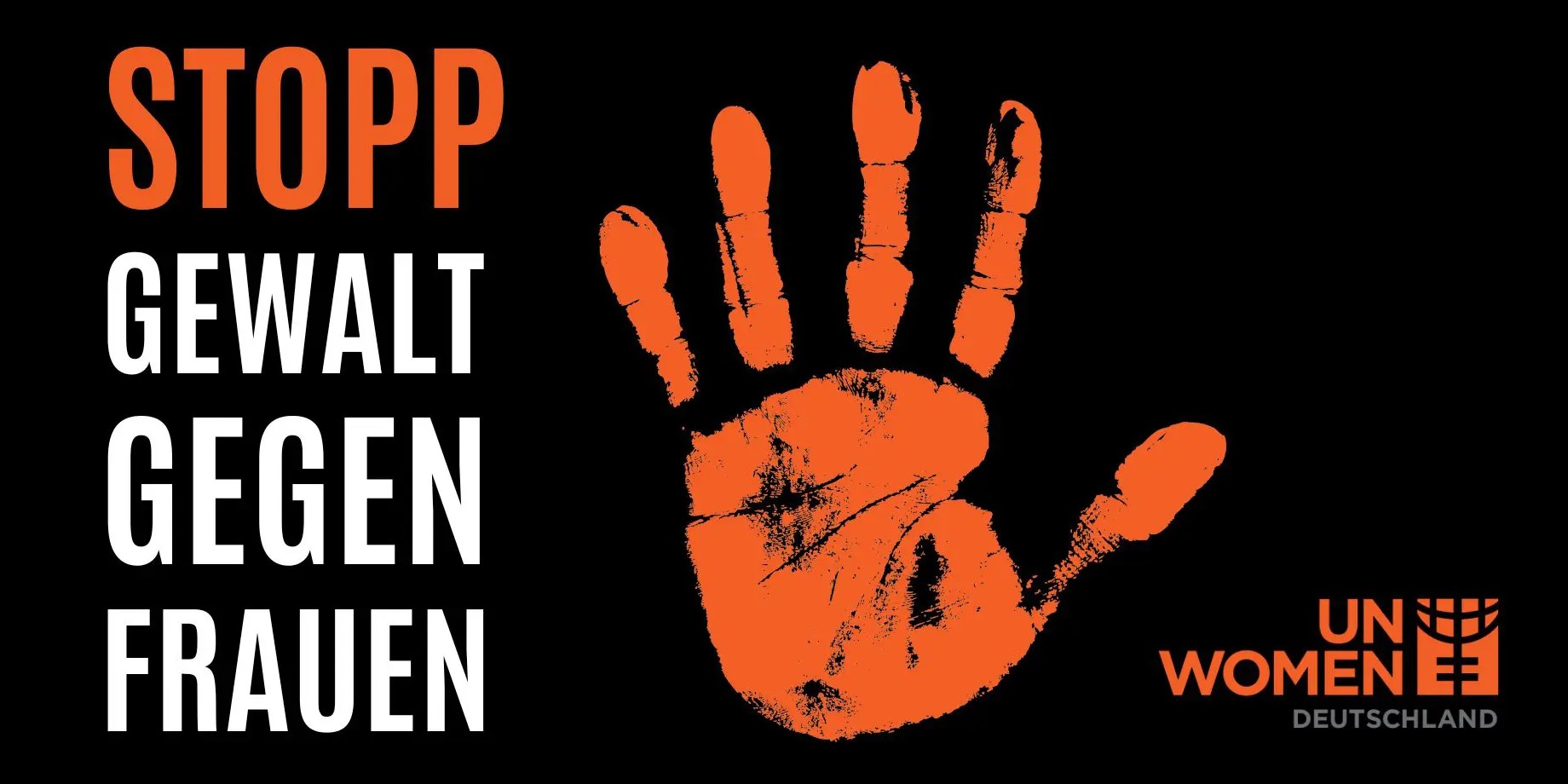 orange Handinnenfläche mit den Worten STOPP Gealt gegen Frauen
